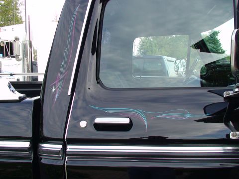 1979 Ford F-250 - This 1979 Ford F-250 features custom pinstriping and chrome accents on its side.