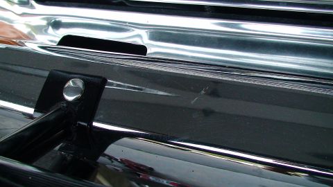 1979 Ford F-250 - Detail of a vehicle's front grille, showing chrome and black accents.