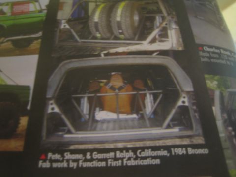 1990 Ford Bronco - printed magazine page shows the caged tube interior of a 1984 Bronco build with a credit caption to Pete, Shane and Garrett Relph.