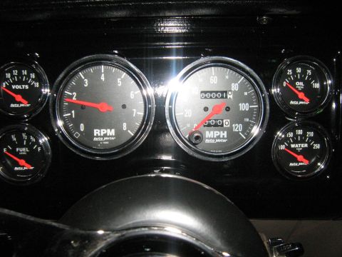 1988 Mercury Grand Marquis - Custom Auto Meter gauges installed on a vehicle's dashboard, showing RPM, speed, fuel, and other vital information.