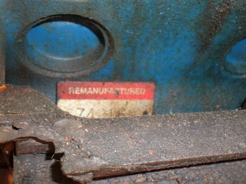 1966 Ford Mustang - Close-up of a remanufactured engine block, showing a label with text and a partial serial number.