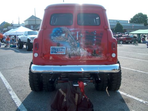 1978 Ford Bronco - This custom van features a patriotic mural on its tailgate, complete with an eagle and American flag elements.