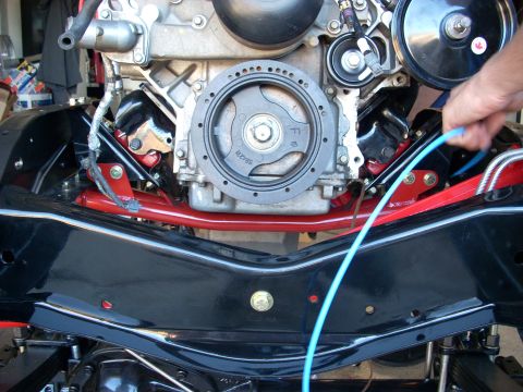 1992 Ford Bronco - Close-up view of engine and chassis components during assembly or repair.