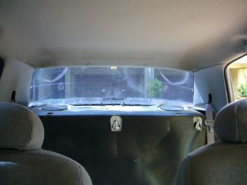 2001 Ford Crown Victoria - Interior view of the rear of a 2001 Ford Crown Victoria, looking towards the back window.