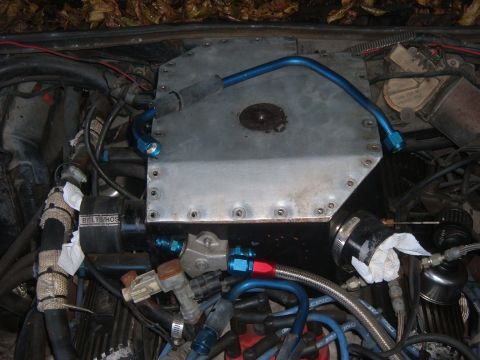 1981 Ford LTD - Working on the carb box. Need to add pipe stubs for the blow off valves, and reroute the fuel lines. See the y-block for the -8 fuel lines,…