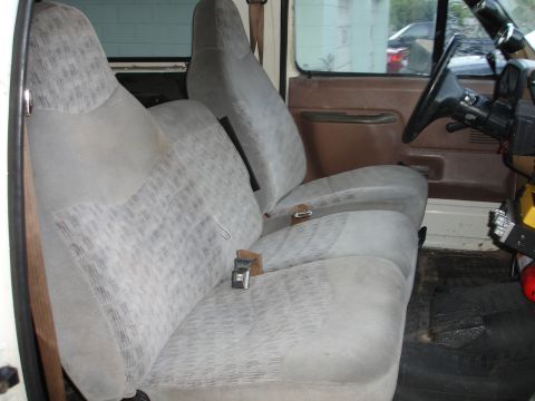 1989 Ford Bronco - Interior view of a 1992 Ford Bronco, showing the front seats and dashboard.