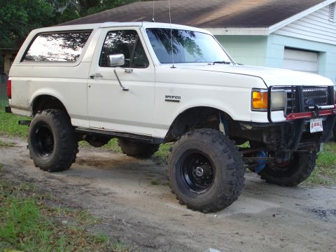 1989 Ford Bronco - This lifted 1989 Ford Bronco features aggressive off-road tires and a custom front bumper.