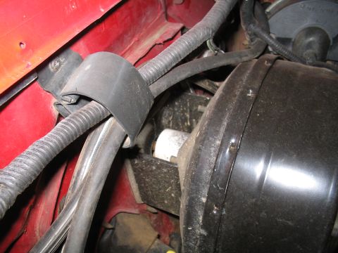 1989 Ford Bronco - Close-up view of the brake booster and master cylinder assembly, likely from a Ford truck.