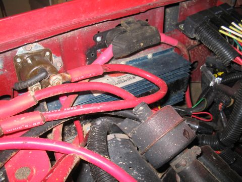 1989 Ford Bronco - Close-up view of a vehicle's dual battery isolator and associated wiring.