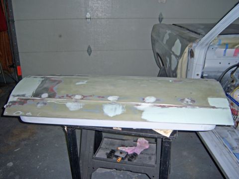 1967 Ford Ranchero - A 1967 Ford Ranchero door is prepped for paint with body filler applied.