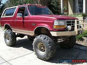 1986 Ford Bronco - This lifted 1992 Ford Bronco is equipped with a custom bull bar and large off-road tires.