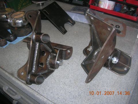 1996 Ford Bronco - Custom metal brackets are shown on a workbench, with a date stamp of 10.01.2007 visible in the lower right corner.