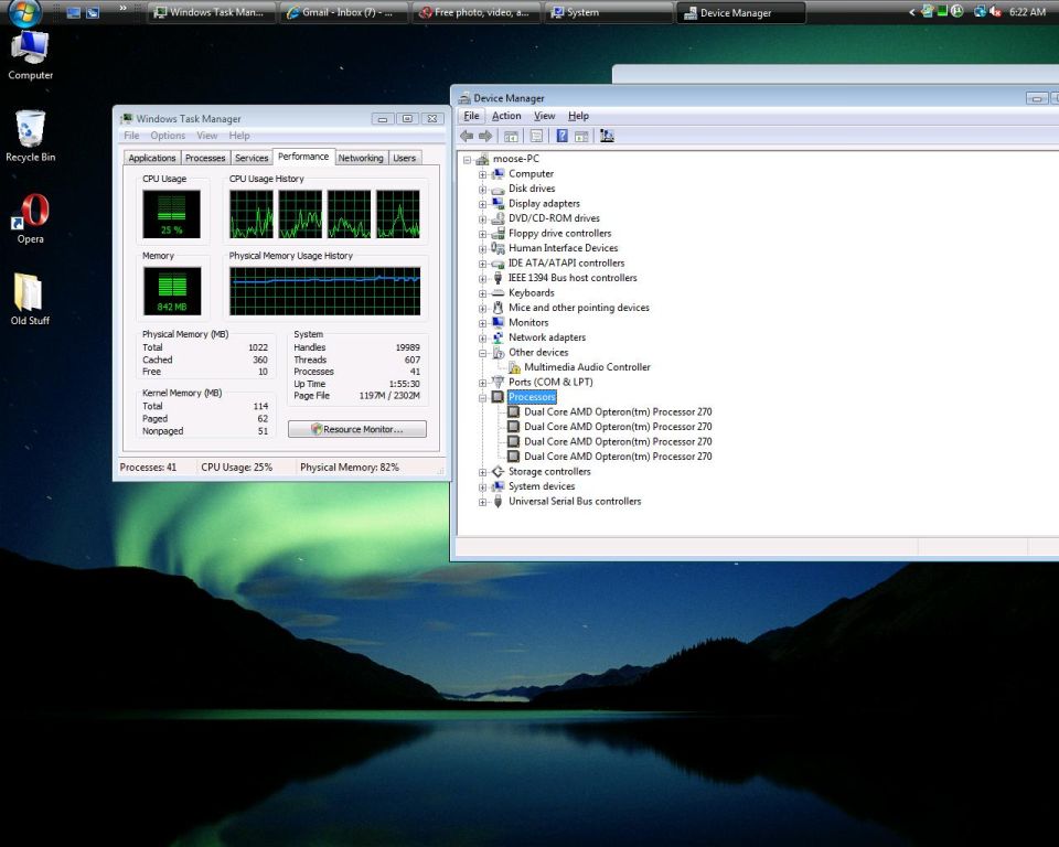 Computer screen with Windows Task Manager and Device Manager open, displaying system information