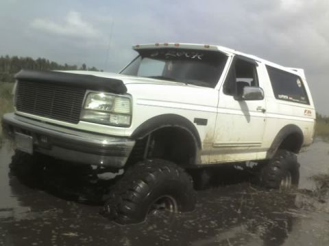1995 Ford Bronco - This 1995 Ford Bronco is stuck deep in the mud.