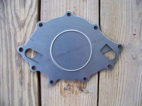 1990 Ford Bronco - The 2 back plates overlaid so the holes line up.