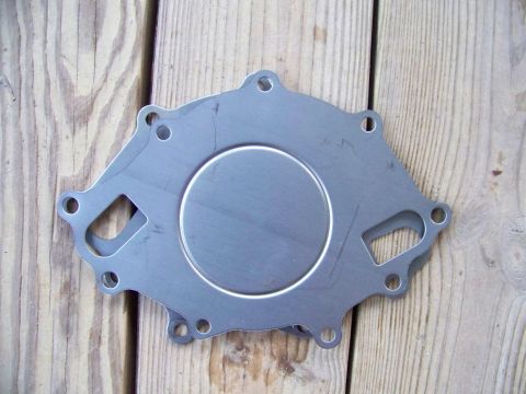 1990 Ford Bronco - The top one reversed so the inlet holes line up (not really). Now the bolt holes will not line up either. There is only one way to mount th…