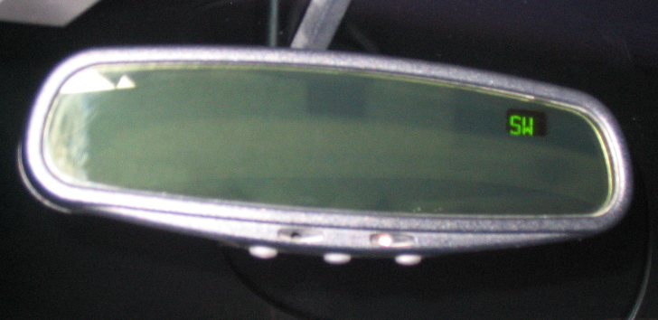 Electrochromic mirror with compass and map lamps from Lincoln Continental
