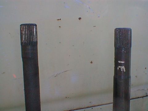1962 Ford Thunderbird - i don't know if you can tell from the picture but the left axle is a stock 28 spline and the right is the 31 spline unit