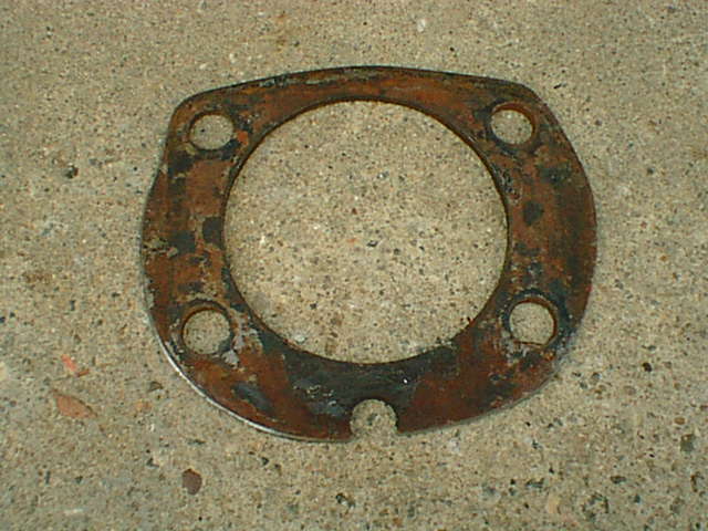 the wheel bearing spacer made by cutting out the old backing plate center.