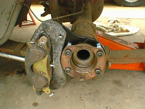 1962 Ford Thunderbird - the caliper brackets mounted up, we are close now.
