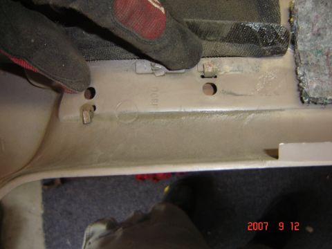 1993 Ford Bronco - Here's the metal tabs you have to bend up to get the door trim off.