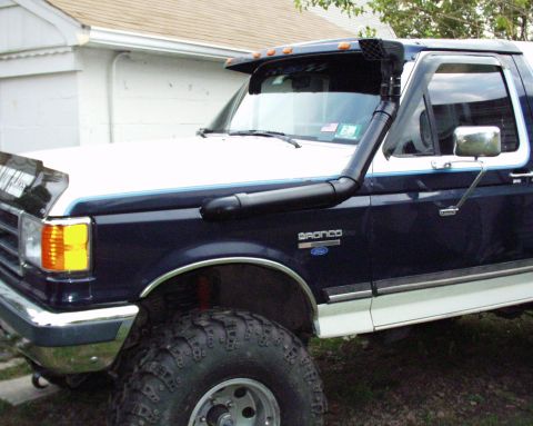1989 Ford Bronco - This Ford Bronco is equipped with a snorkel, a common modification for off-road vehicles.
