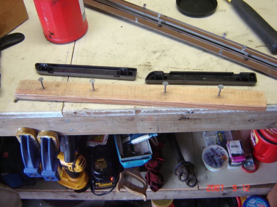 Check out my trick ass painting stands. Roofing nails and scraps of wood.