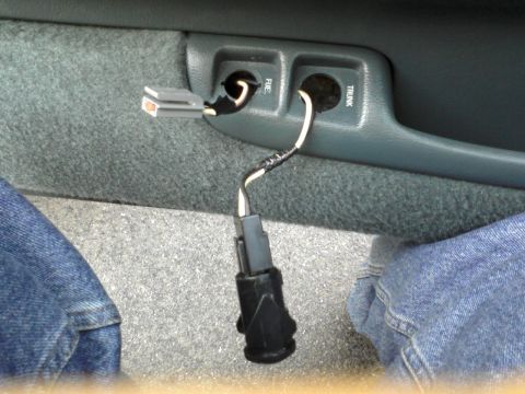 1996 Mercury Grand Marquis - Trunk release switch popped out, fuel door switch wiring fished out the hole.