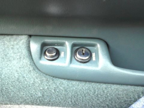 1996 Mercury Grand Marquis - Fuel door switch and trunk release switch installed.