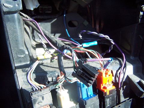 1994 Ford Probe - This image shows a complex automotive wiring harness with various colored wires and electrical connectors.