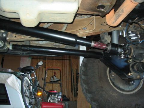 1995 Ford Bronco - Close-up view of the vehicle's modified drivetrain and suspension system.