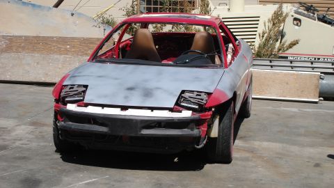 1996 Ford Probe - This 1996 Ford Probe is in primer and appears to be undergoing restoration or has undergone significant bodywork.