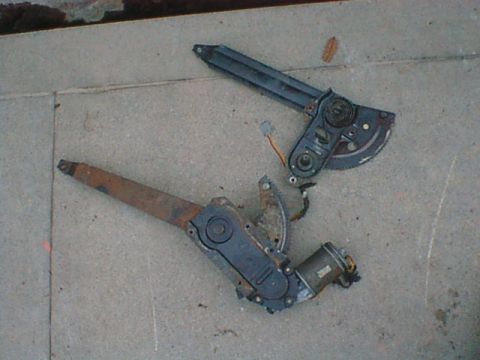 1977 Ford F-250 - Here is the stock regulator next to the 86 F150 regulator. Originally, I was going to shorten the newer regulator to match the stock one bu…