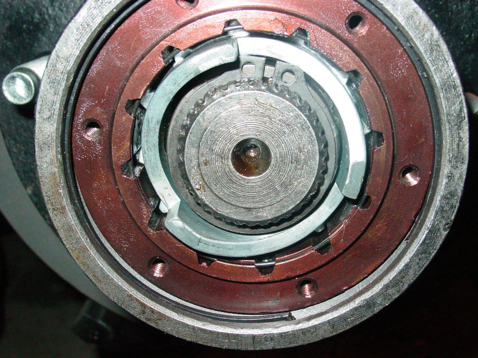 close-up of a hub assembly part with gears and locking mechanism