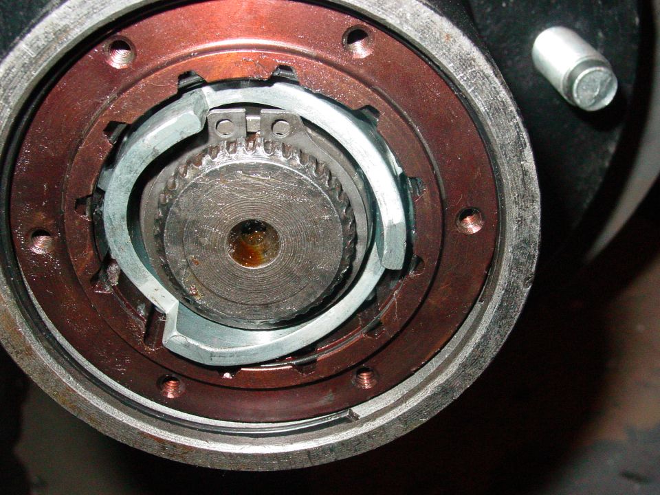 close-up of a vehicle's hub assembly with gears and locking mechanism