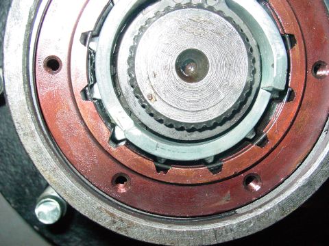 1979 Ford Bronco - A close-up view of a vehicle's hub assembly, revealing intricate mechanical components and gears.