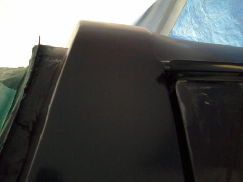 1992 Ford Bronco - Detail of a vehicle's body panel and trim, with a SUPERMOTORS watermark visible.
