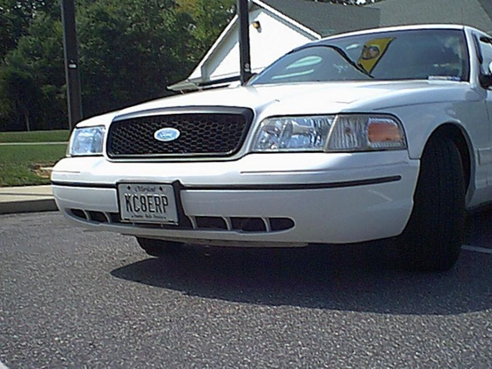 1998 Ford Crown Victoria front end with KCBERP license plate. Grille has Ford oval emblem
