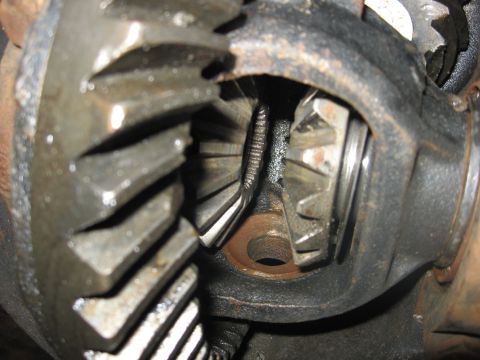 1988 Ford Bronco - Differential gears are visible within the housing, showing wear and lubrication.