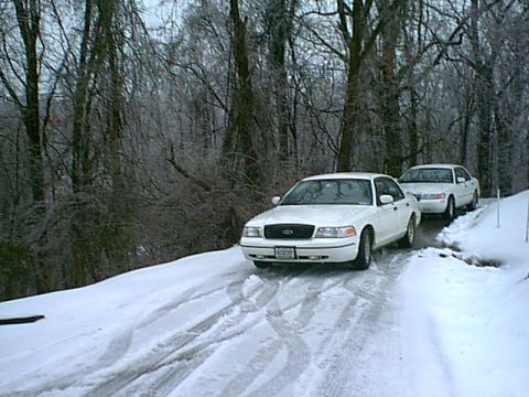 1998 Ford Crown Victoria - Back home in WV (Dads 01 GM behind me)