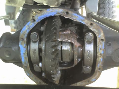 1995 Ford Bronco - The internal gears of a vehicle's differential are exposed for inspection.
