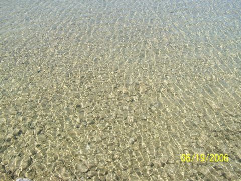 2003 Ford Crown Victoria - The image shows a shallow body of water with a rocky bottom, dated 05/19/2006.