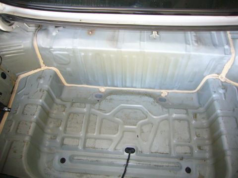 2001 Ford Crown Victoria - The interior of a car trunk after cleaning and sealant application.