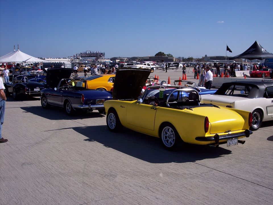 Yellow convertible sports car rear view