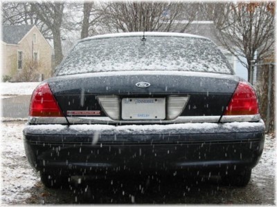 1999 Ford Crown Victoria - Ford Crown Victoria parked outside during a snowfall.