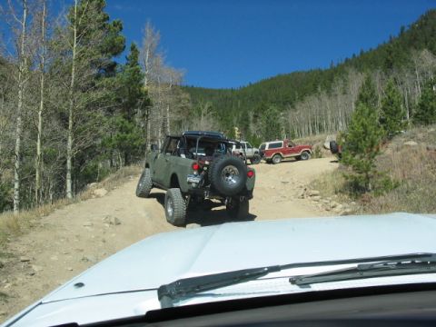 1995 Ford Bronco - Heading out on the trail, nice IH in front