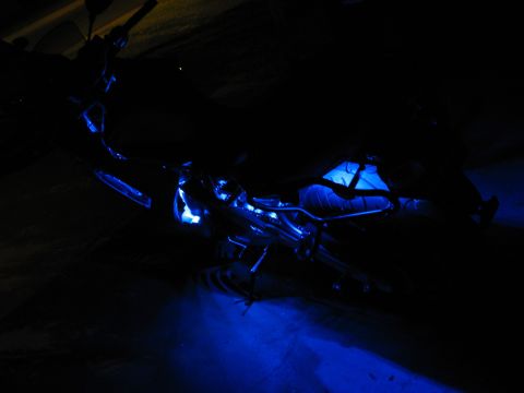 2007 Kawasaki Ninja - Motorcycle with blue underglow lights illuminated in the dark.