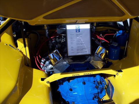 1971 Ford Mustang - Document in engine bay of a yellow 1971 De Tomaso Pantera, labeled 'Pasta Rocket'.