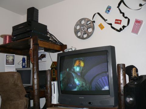 2006 Ford E350 - TV, desk, and speakers.