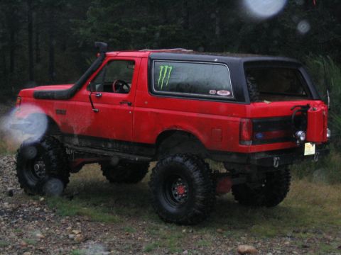 1989 Ford Bronco - Modified 1989 Ford Bronco with off-road accessories like a snorkel and extra fuel can.